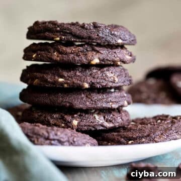 10 Irresistible Baileys Dessert Recipes for St. Patrick’s Day 8 Baileys Chocolate Mint cookies stacked on a white plate