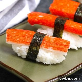Kanikama Sushi Roll is made with imitation crab meat, sushi rice and nori seaweed sheet. It’s so easy to make and I’ll share with you how to make perfect kanikama nigiri sushi.