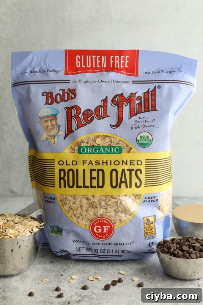Bob's Red Mill Organic Old Fashioned Rolled Oats bag with chocolate chips, oats, and tahini in measuring cups