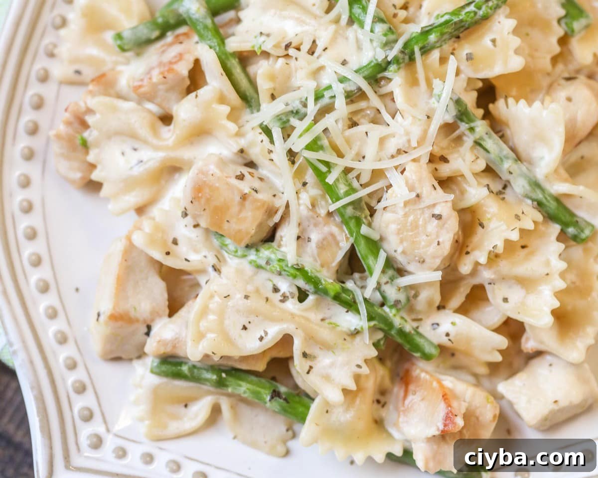 Chicken Asparagus Pasta on a white plate