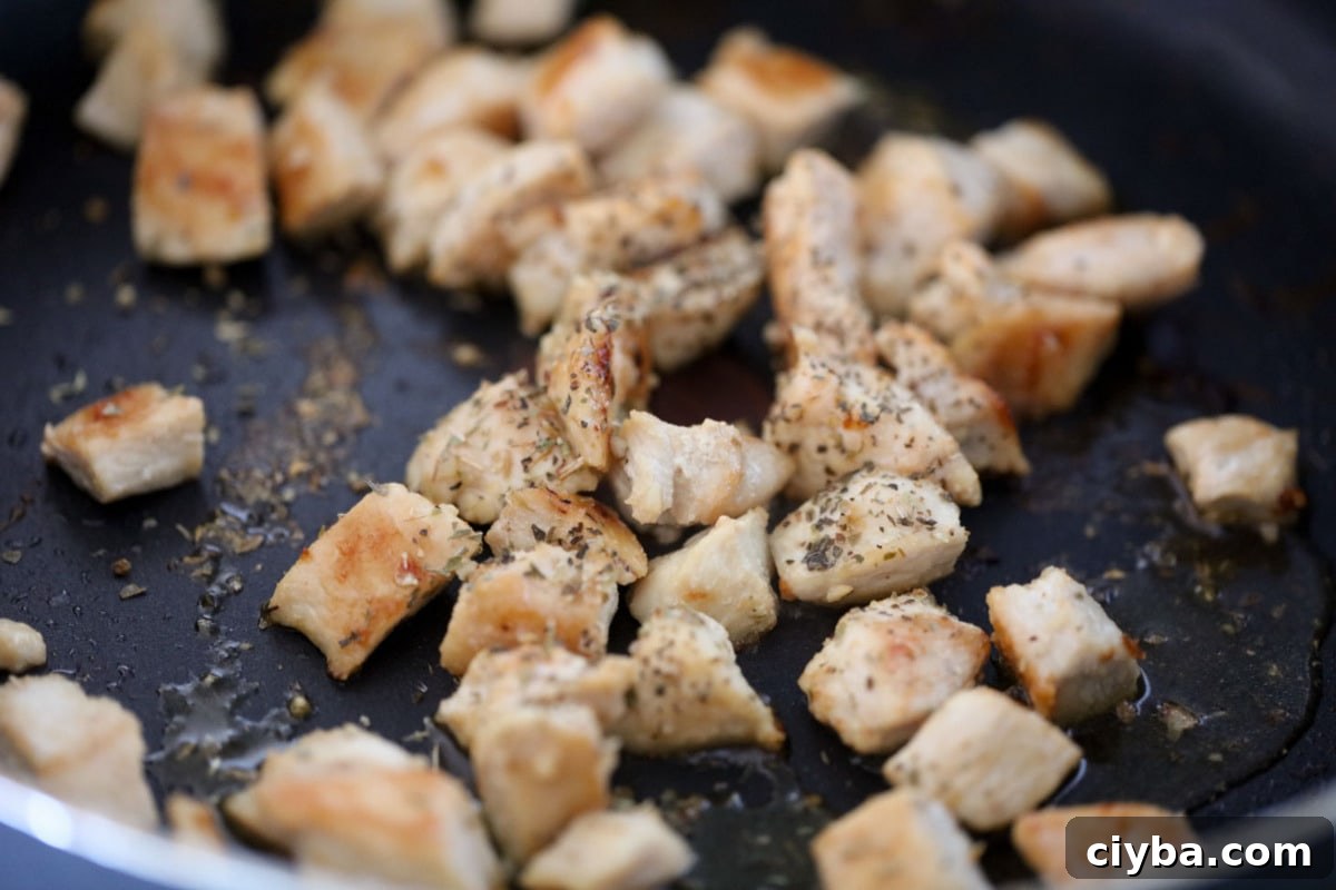chicken diced and cooked in a skillet