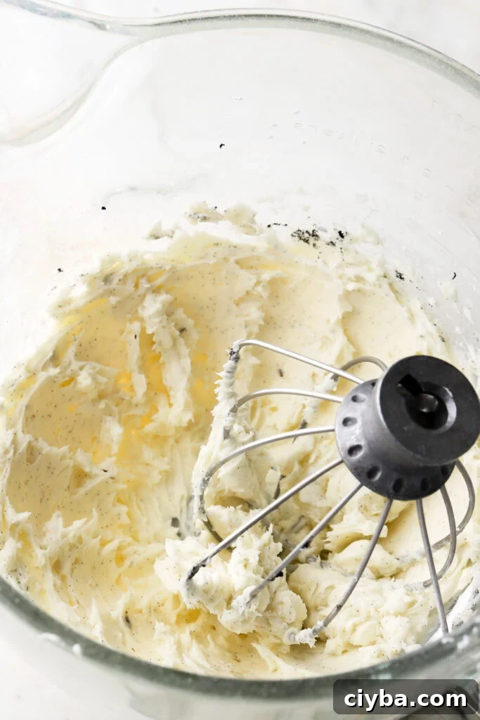 Fluffy Mascarpone Frosting Recipe for Cakes and Cupcakes 3 mascarpone beat with powdered sugar