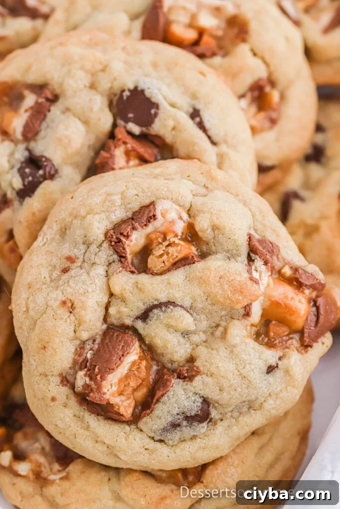 Snickers Cookies stacked together.