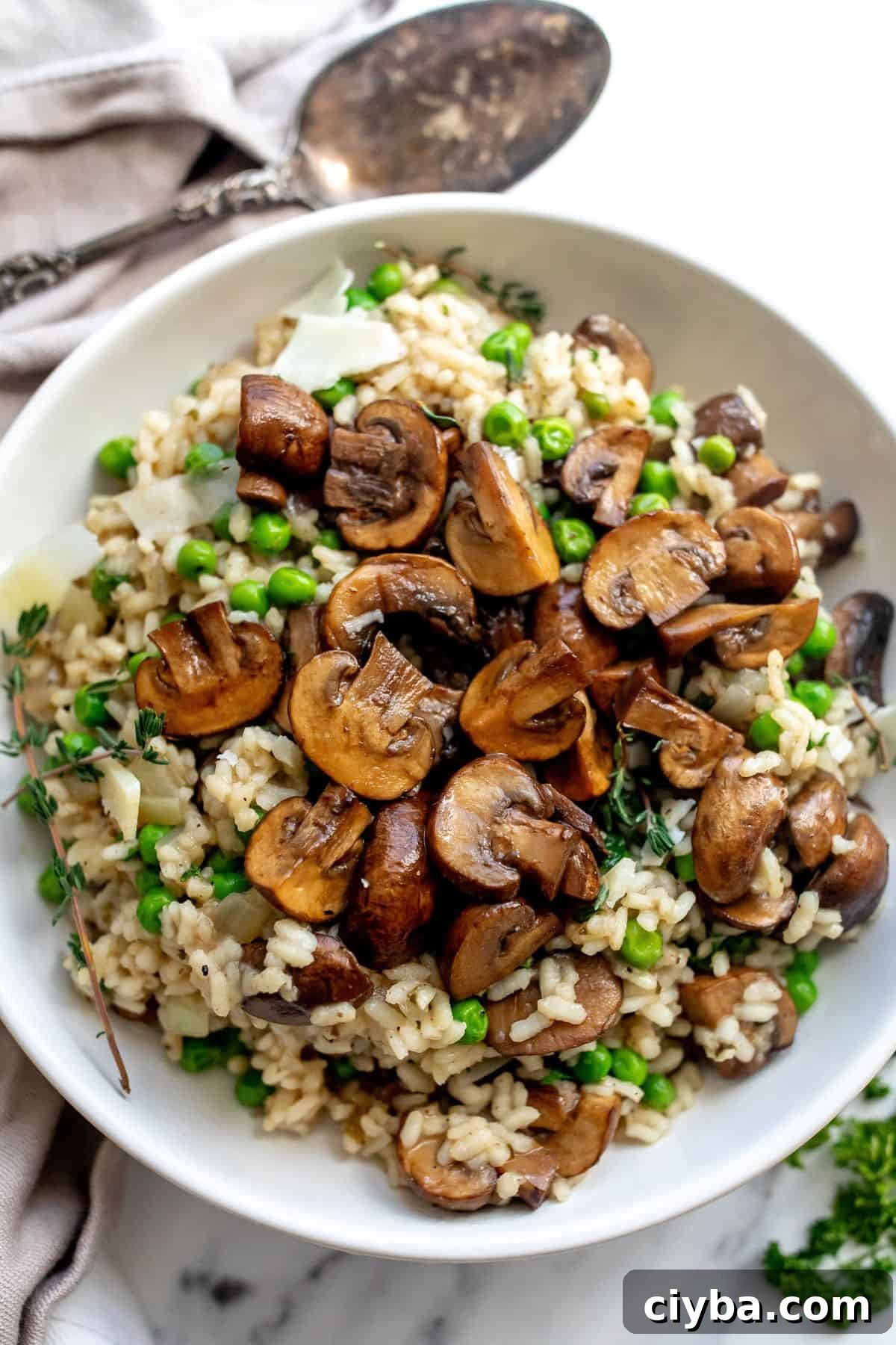 An image of the ingredients of mushroom pea risotto.