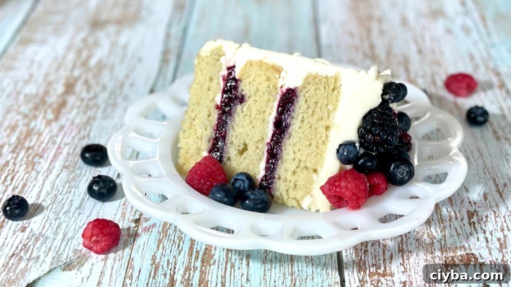 Vanilla Almond cake with triple berry compote filling