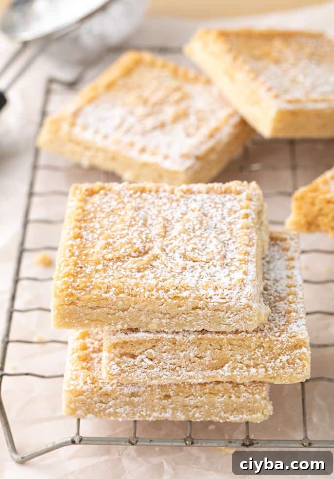 Stack of 3 shortbread squares on wire rack