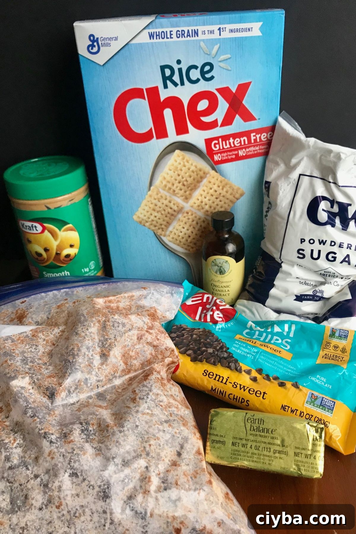 Gluten and Dairy-Free Puppy Chow Recipe for Homemade Treats 2 Gluten Free Rice Chex, peanut butter, dairy free butter, powdered sugar, vanilla, and dairy free chocolate chips.