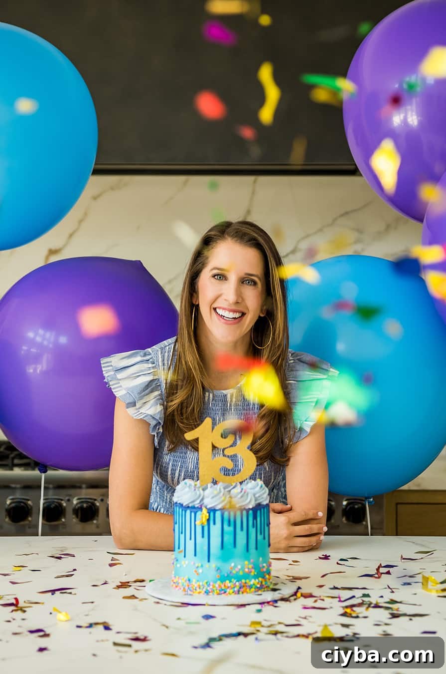 Kelly Senyei with balloons and confetti