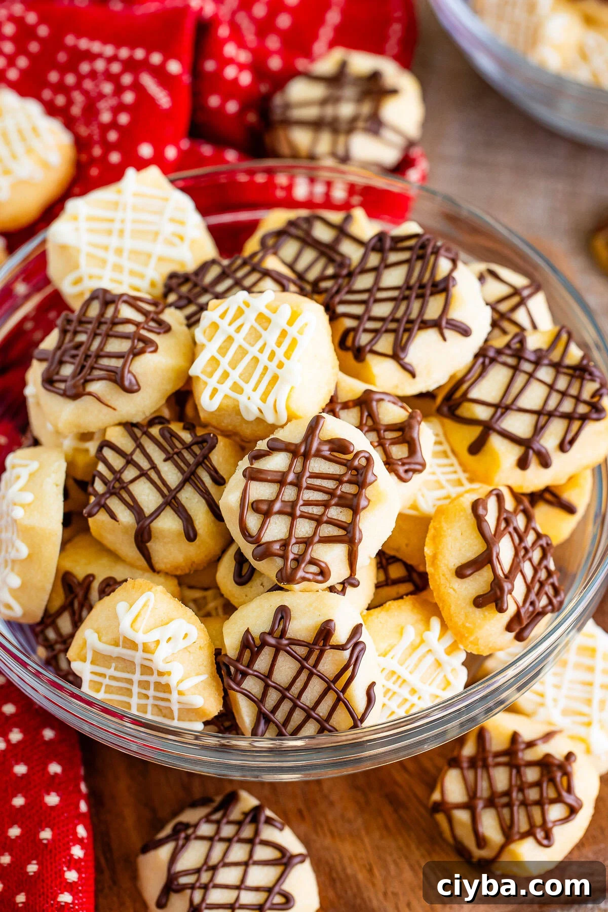 overhead christmas shortbread in a bowl drizzled with chocolate