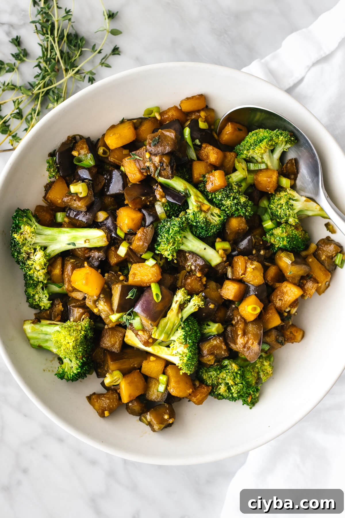 A bowl of butternut squash and eggplant stir fry