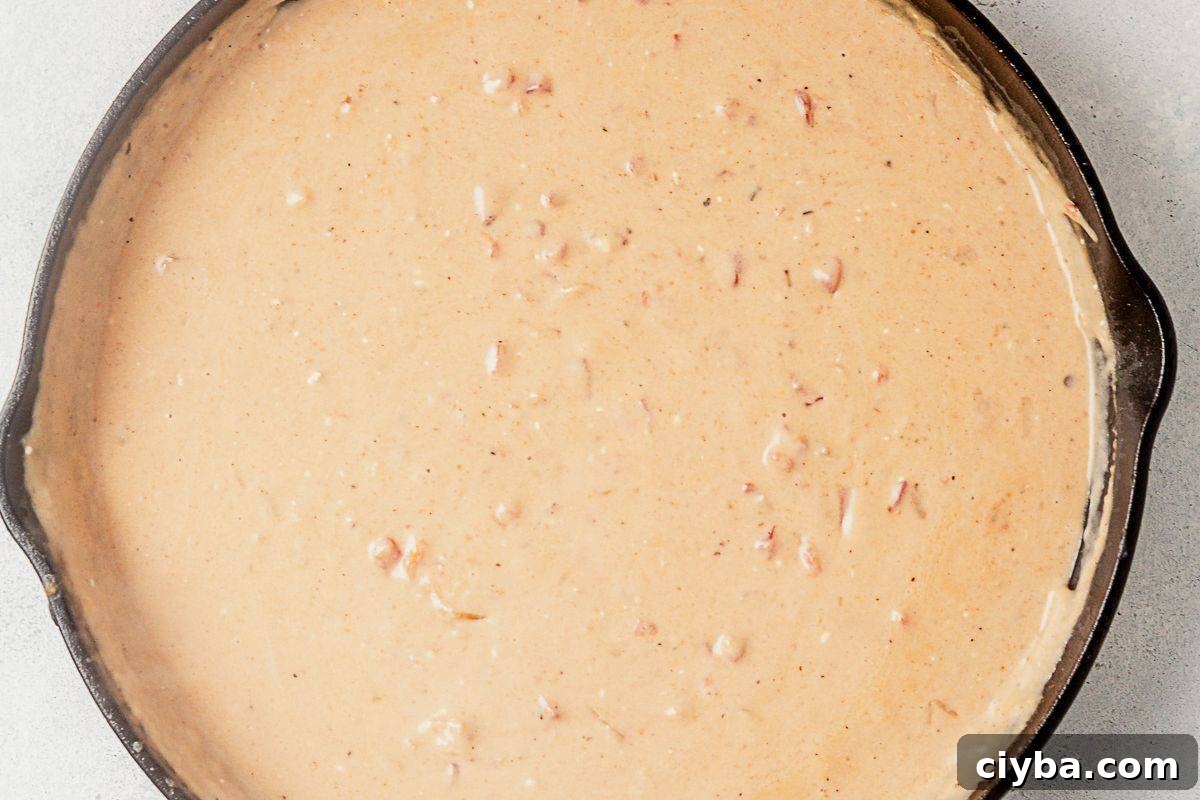 creamy homemade alfredo with cream cheese and rotel in a skillet