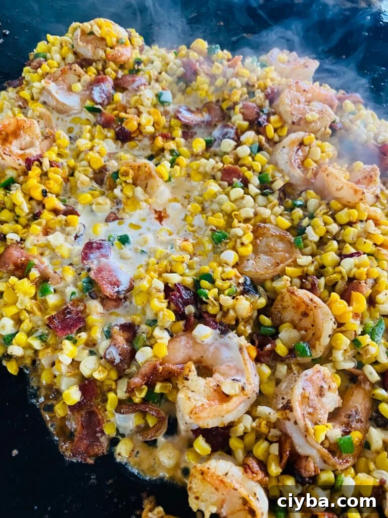 Blackstone Shrimp with Bacon and Grilled Corn 6 Adding the heavy cream to the corn and shrimp