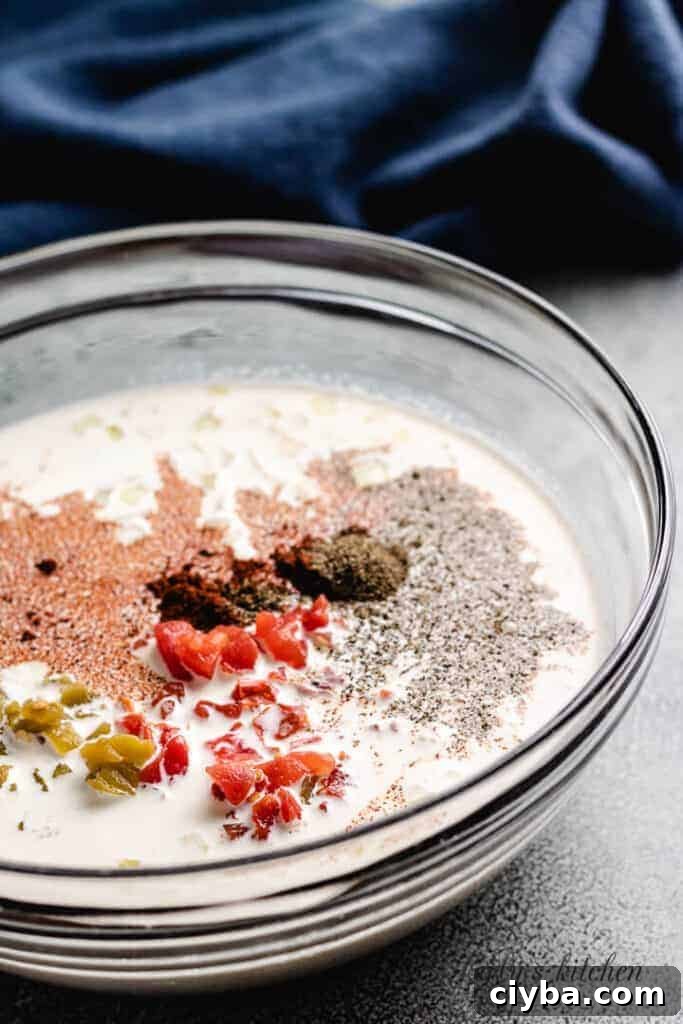Eggs, heavy cream, and other ingredients in a mixing bowl.