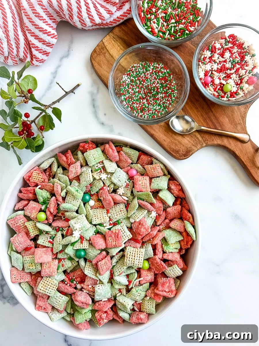 Large bowl of sweet and colorful cereal next to a smaller glass bowls of sprinkles on a white surface.