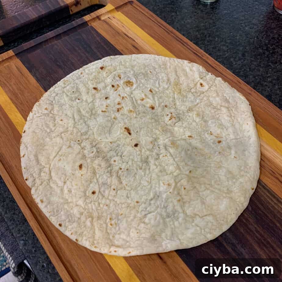Crispy Pulled Pork Crunchwrap Supreme Recipe 3 tortilla for pulled pork crunch wrap