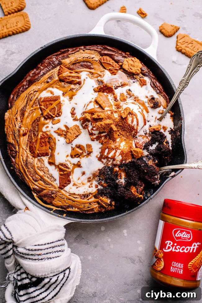 Cookie Butter Skillet Brownie Recipe — Gooey, Crunchy & Quick 11 Sliced skillet brownie