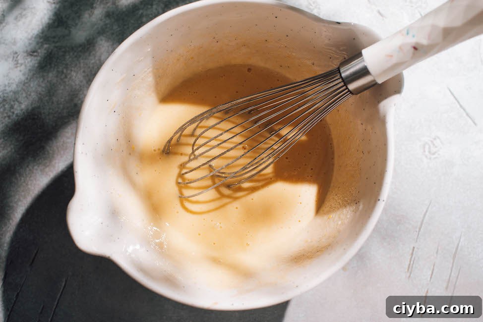 Cookie Butter Skillet Brownie Recipe — Gooey, Crunchy & Quick 5 Pouring chocolate
