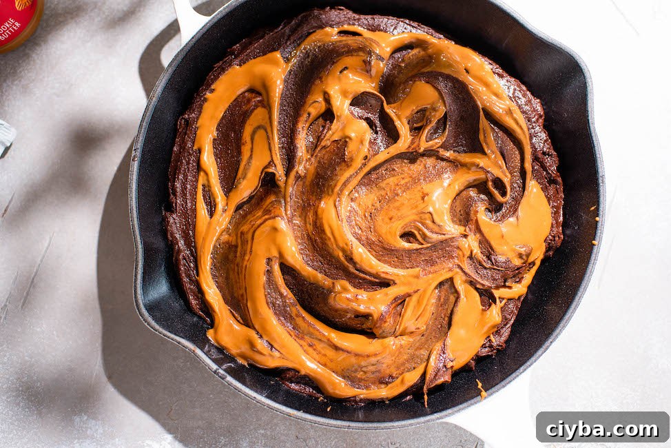 Cookie Butter Skillet Brownie Recipe — Gooey, Crunchy & Quick 9 Baked skillet brownie
