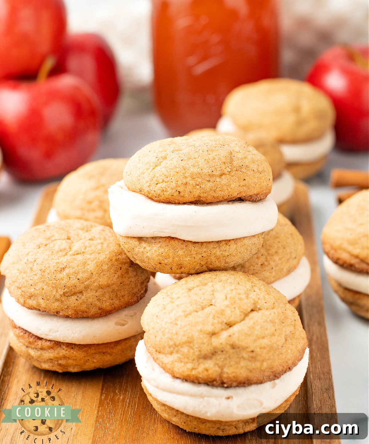 Apple Cider Snickerdoodle Cream Pie Recipe 3 Stack of soft and chewy apple cider snickerdoodle cream pies showing the frosting layer inside.