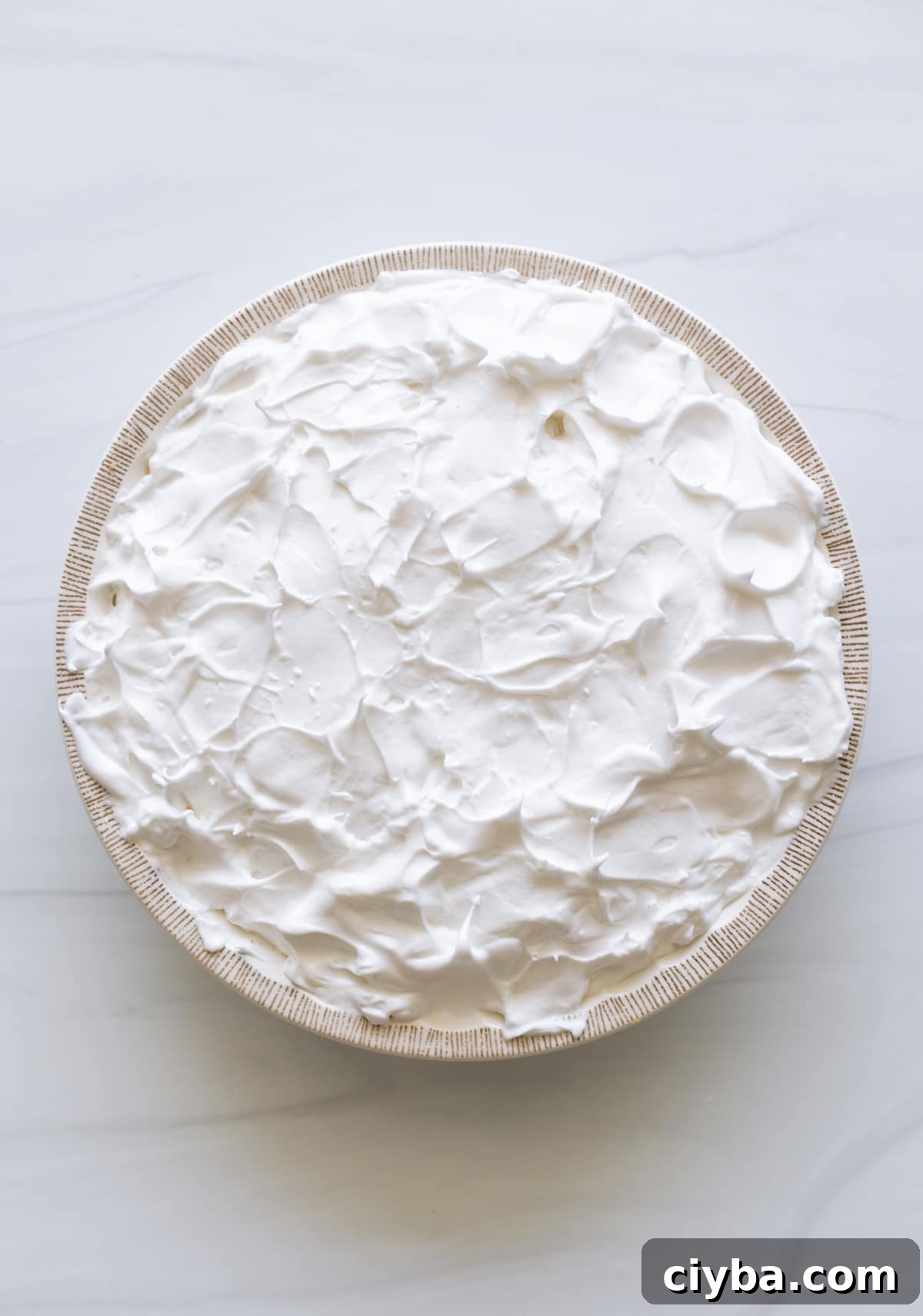 Pie getting ready to be baked and put in the oven.