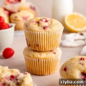Lemon Raspberry Muffins with Zesty Lemon Glaze 16 A stack of lemon raspberry muffins.