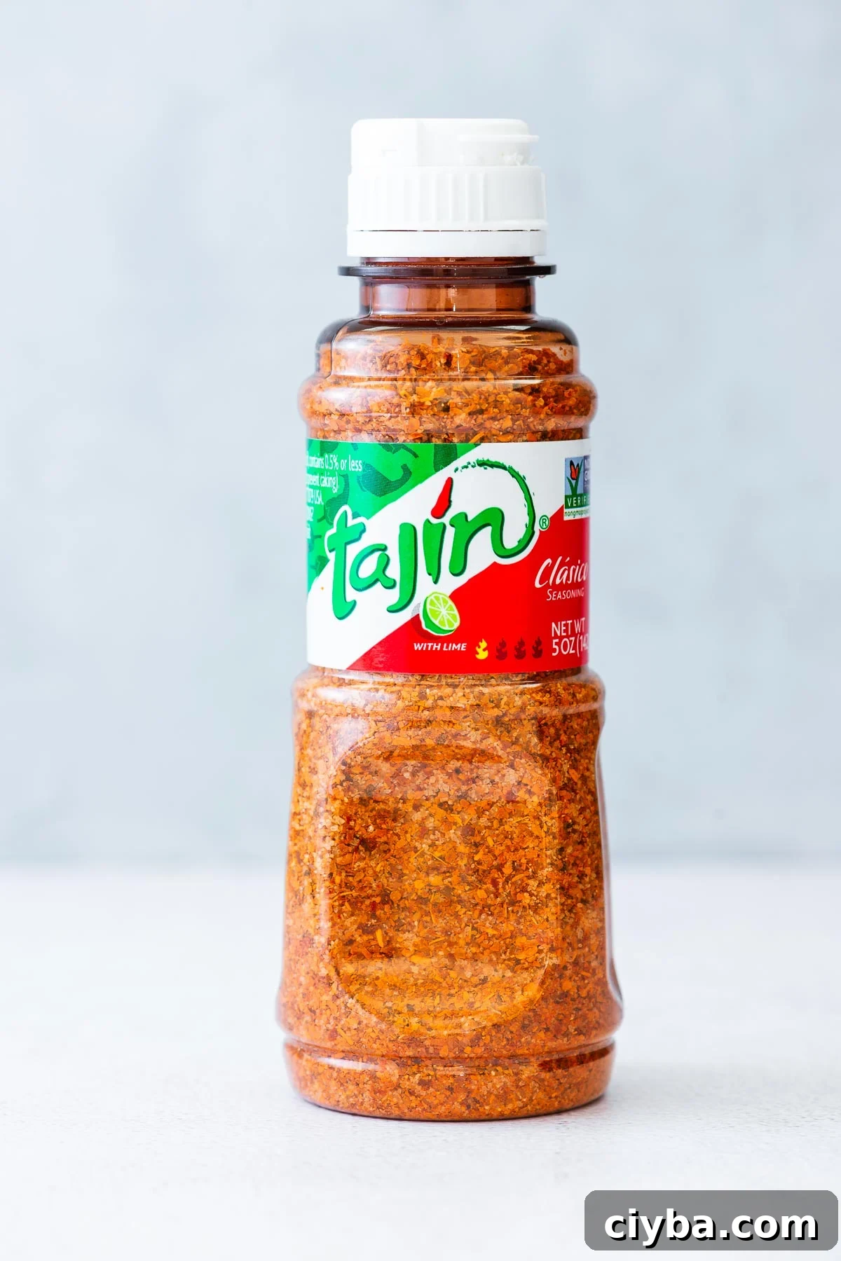 A bottle of Tajín Clásico Seasoning.