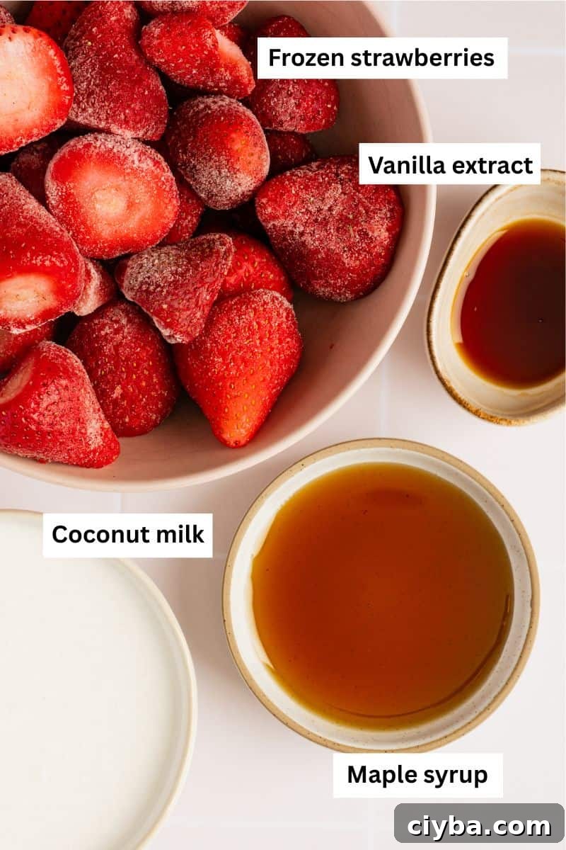 Frozen strawberries, milk, maple syrup and vanilla extract in separate bowls.