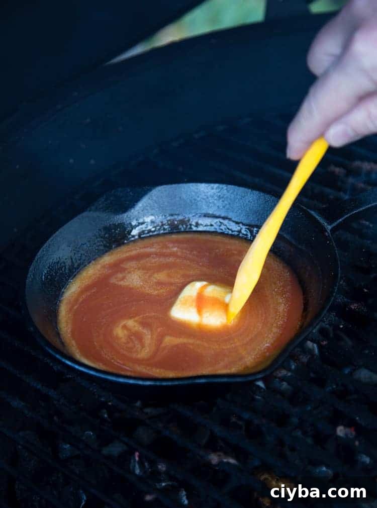 buffalo sauce on the grill with butter
