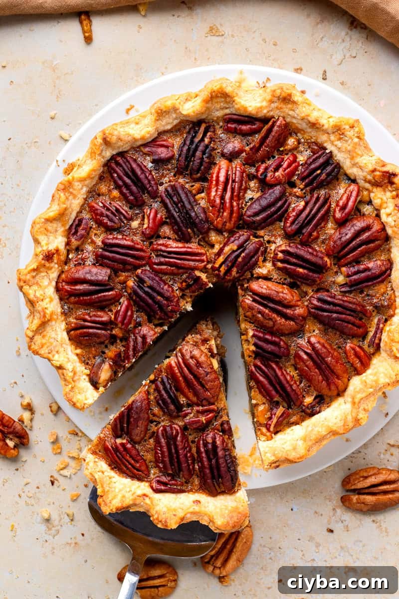 Gluten Free Pecan Pie with No Corn Syrup with a slice cut out