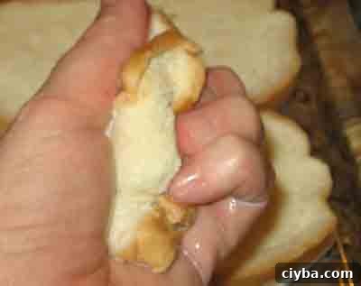 Squeeze excess milk out of bread for greek beef patties recipe, biftekia.