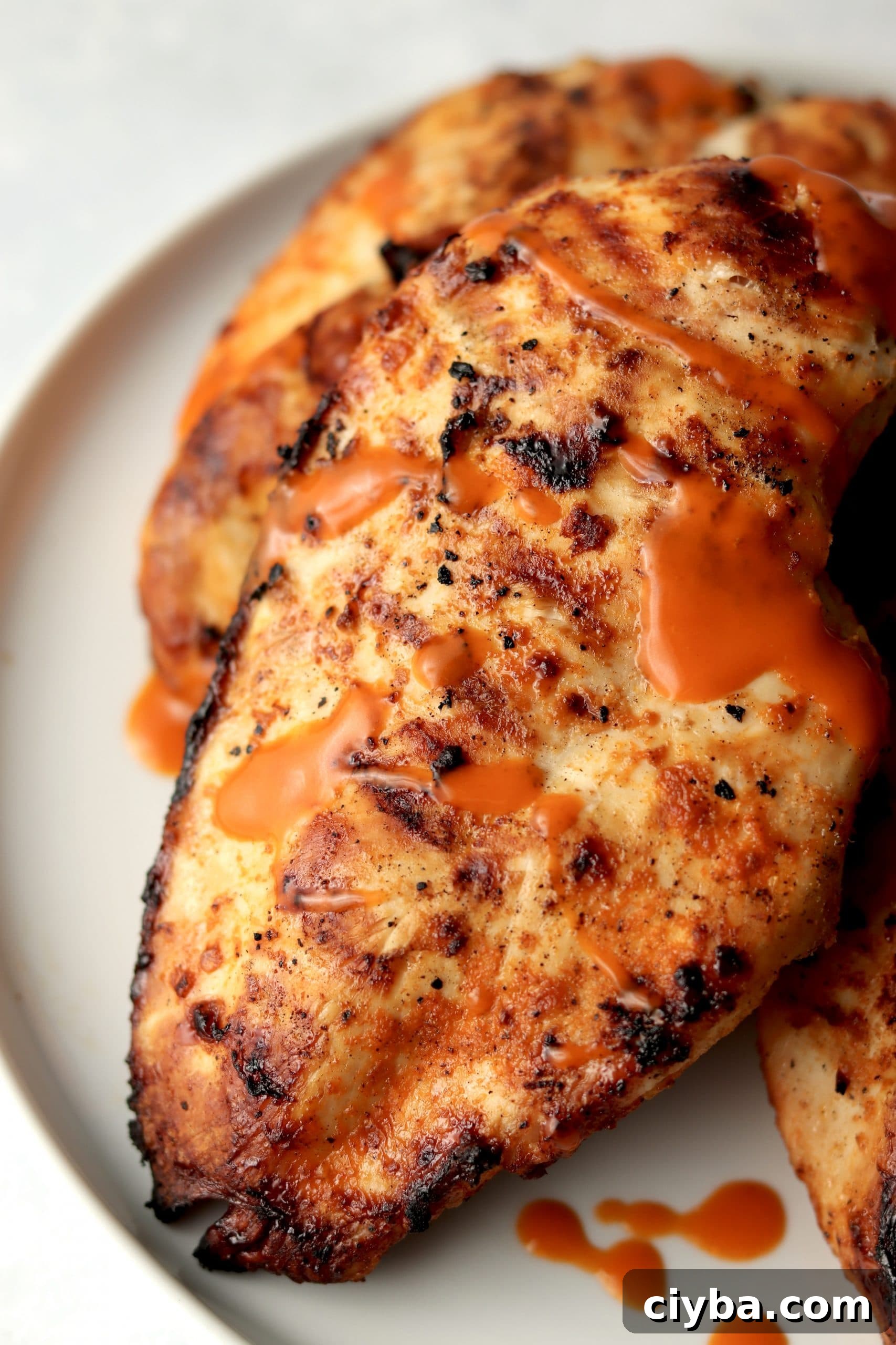 Grilled chicken breast with buffalo sauce