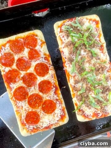 Flatbread pizzas on the Blackstone griddle.