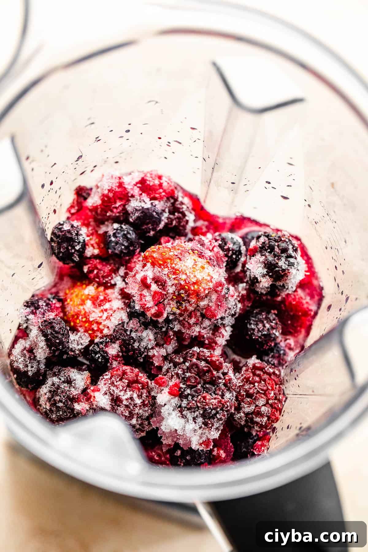 frozen berries in a blender