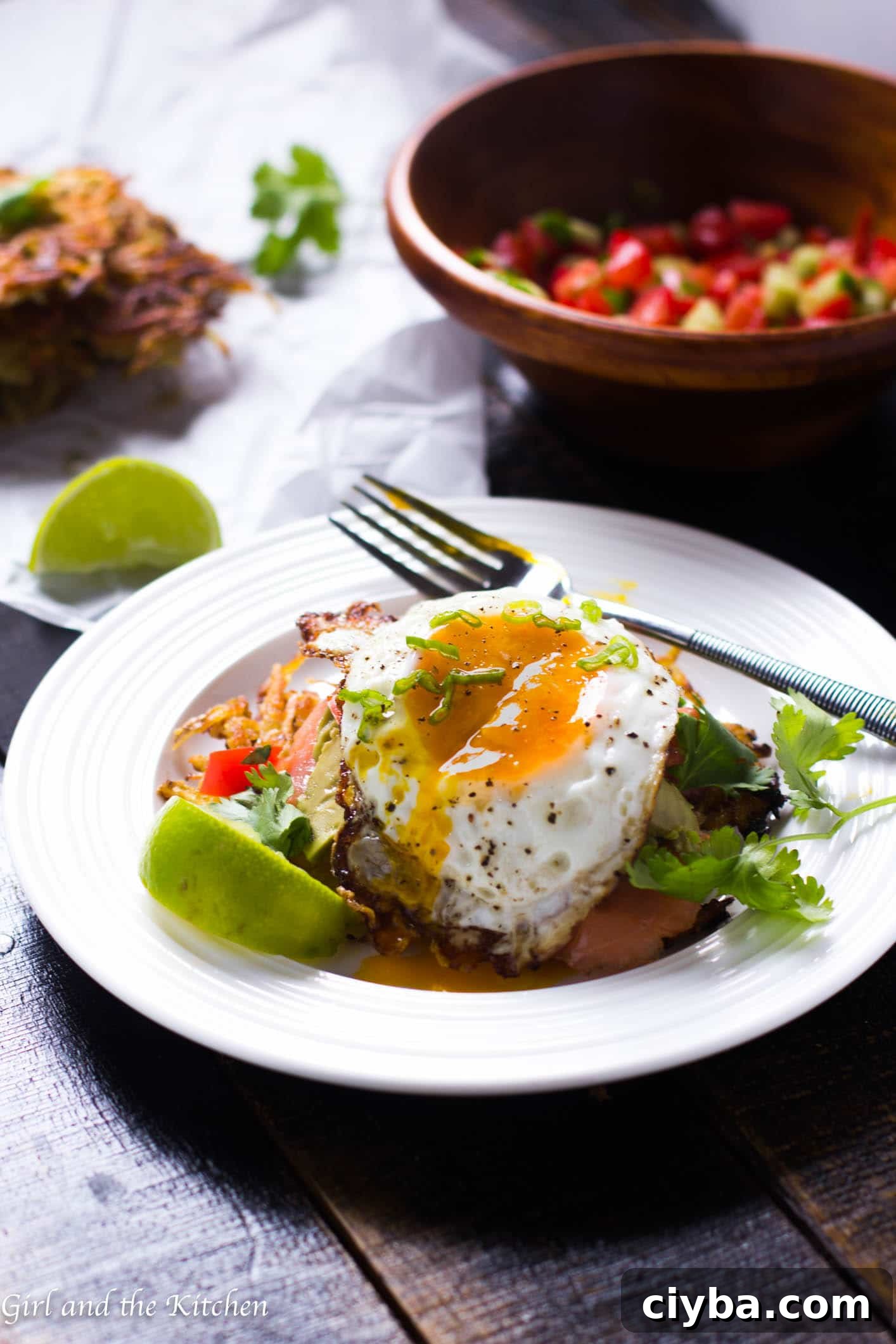 Keep things healthy, crispy and delicious with this hash brown breakfast tostada. Topped with salty smoked salmon, a cucumber salsa and a runny fried egg, this is the perfect breakfast when classic breakfasts are a bore.