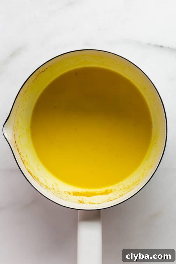 turmeric latte in a white pot