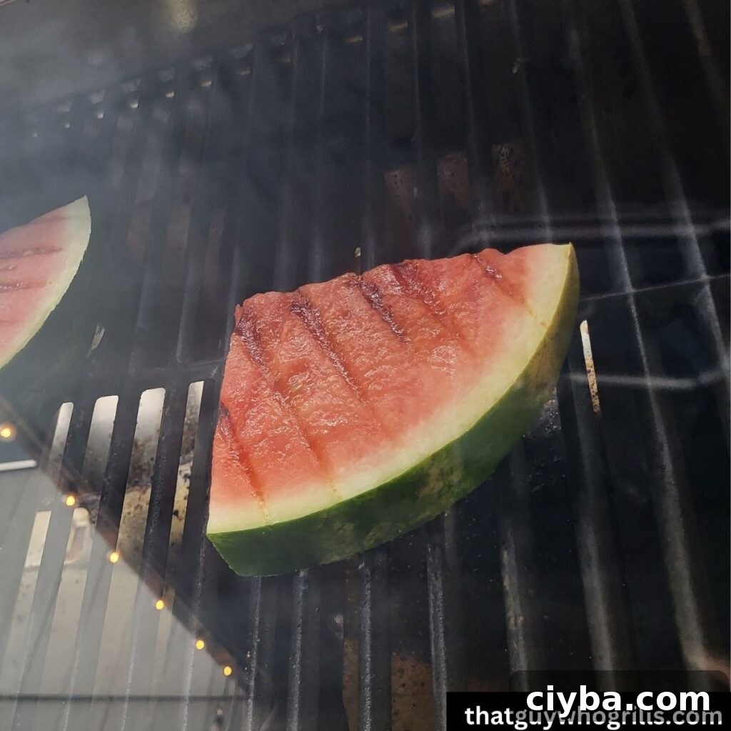 Grilled Watermelon on a gas grill thru glass on gas grill