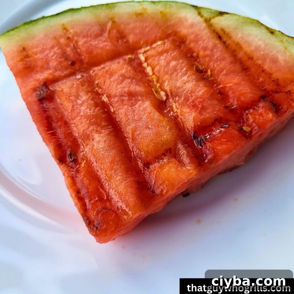 Grilled watermelon on a white plate