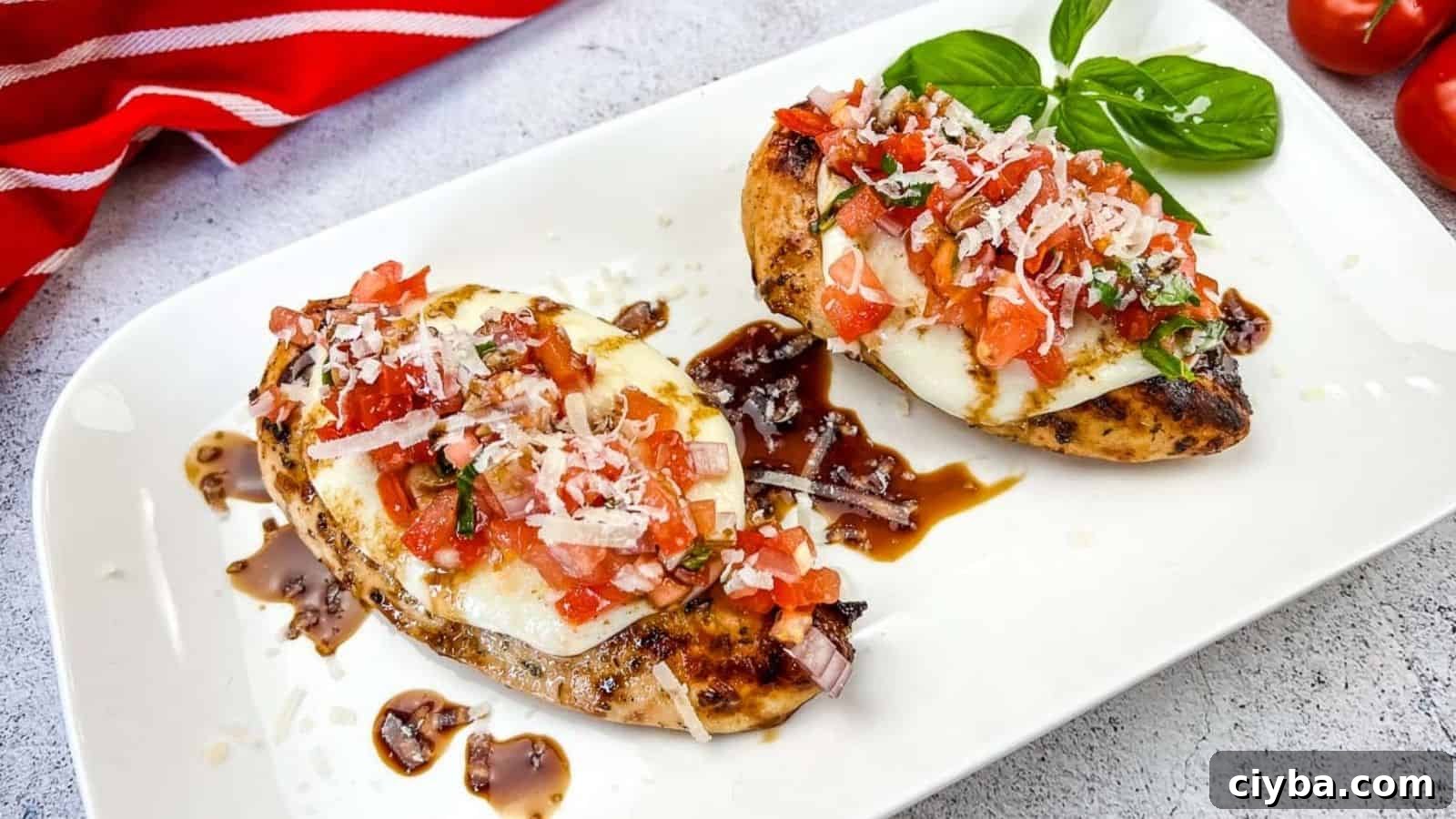 Grilled Bruschetta Chicken on a white plate.
