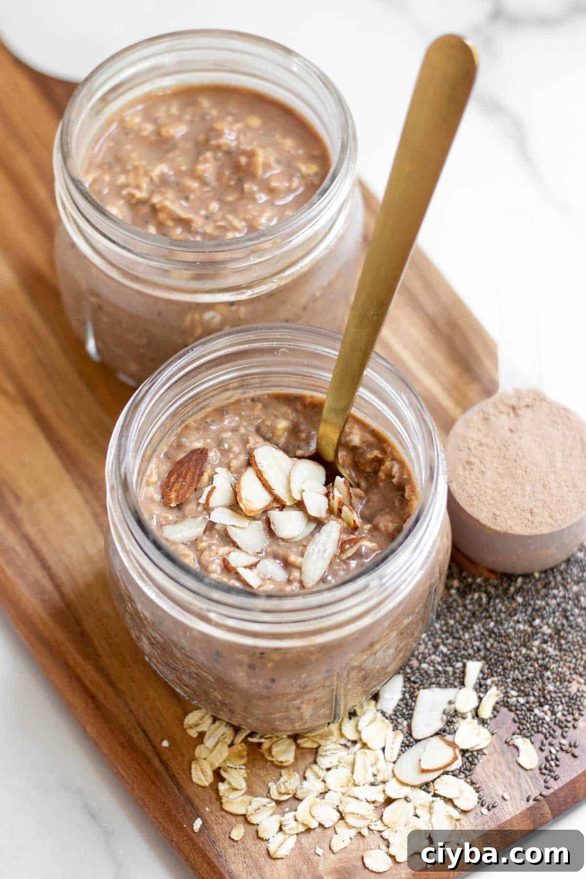 Protein Powder Overnight Oats topped with almond slices.