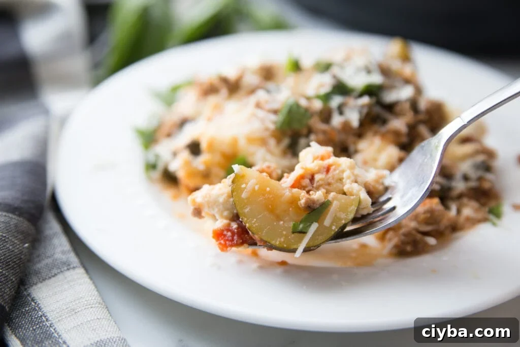Slice of zucchini lasagna ready to serve