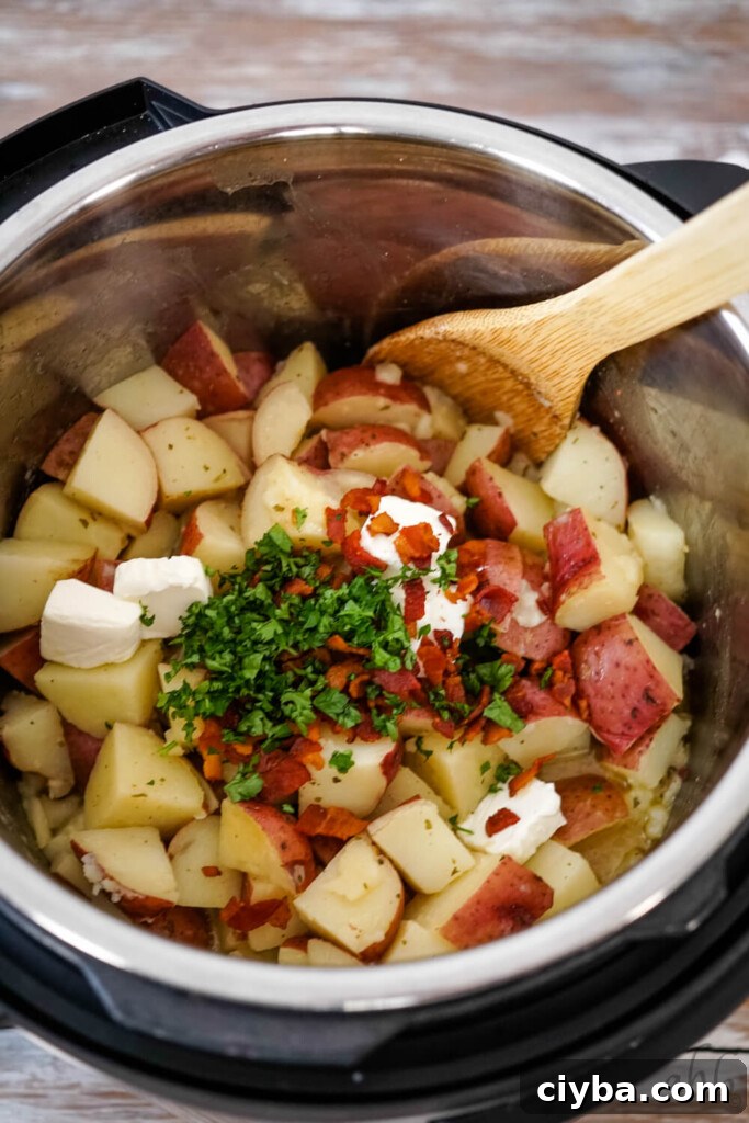 After cooking, the bacon, parsley and cream cheese are added to the instant pot. 