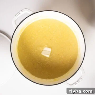 Polenta removed from the heat combined with butter and parmigiano.