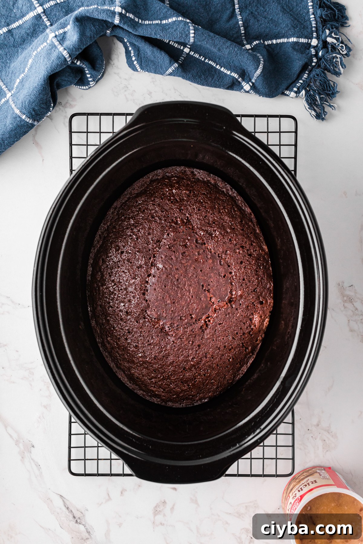 Slow Cooker German Chocolate Cake Recipe: Moist, Rich & Effortless 6 German chocolate cake after being baked in a crockpot.
