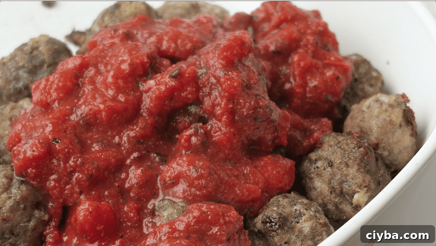 Quick Vegan Marinara Sauce Recipe – Ready in Minutes 11 simple marinar sauce poured over the best baked meatballs