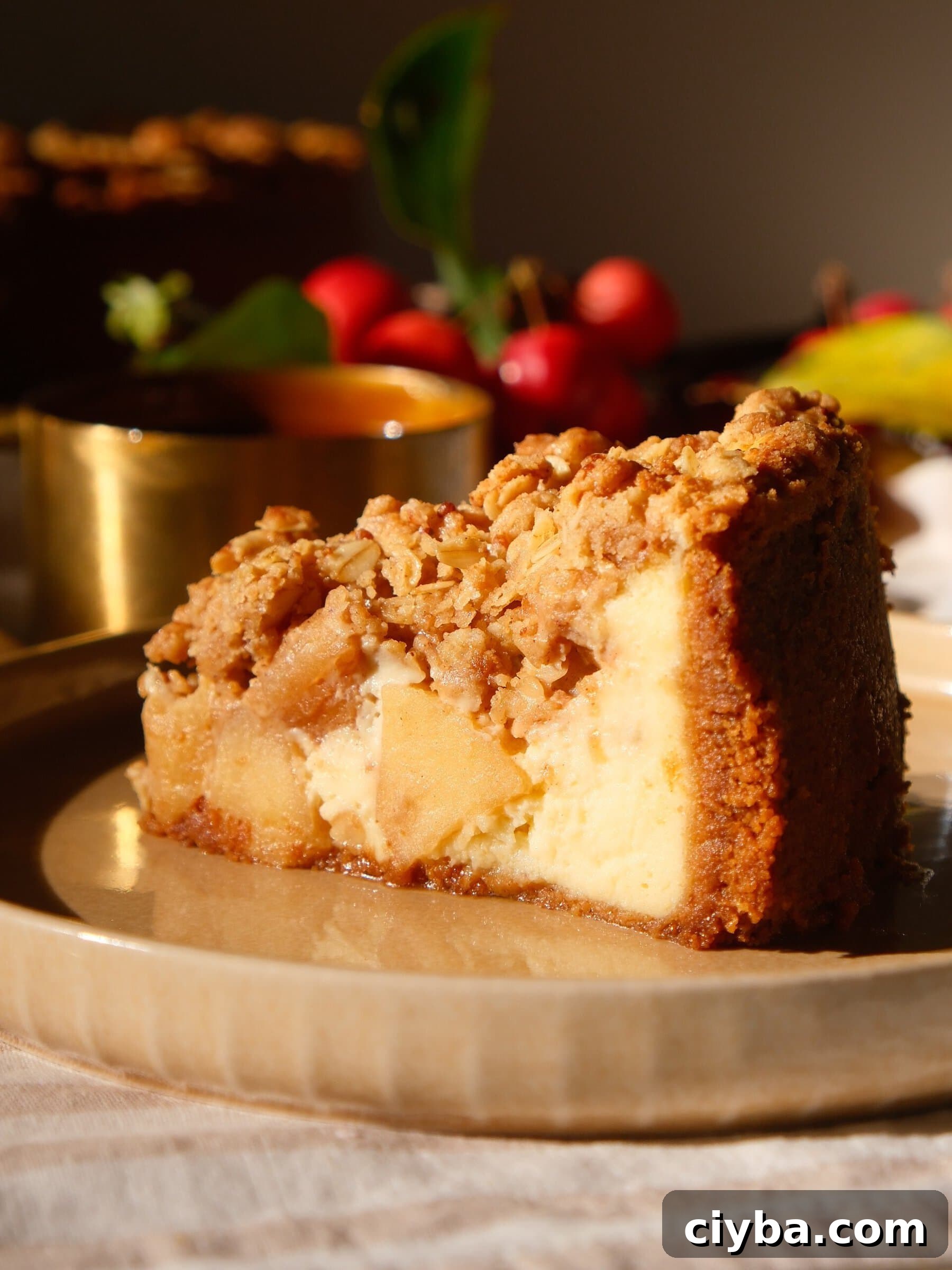A slice of Apple Crumble Cheesecake.