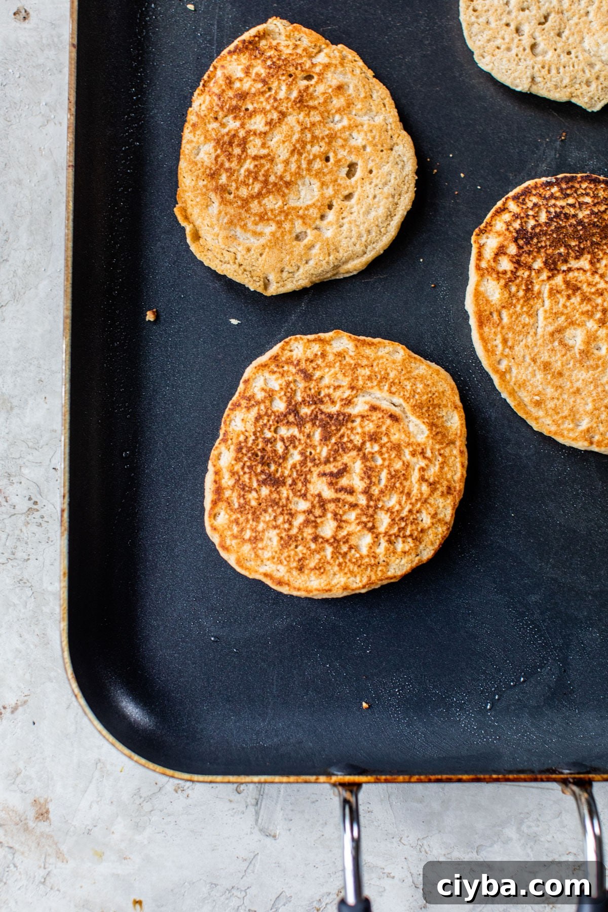 pancakes on a griddle