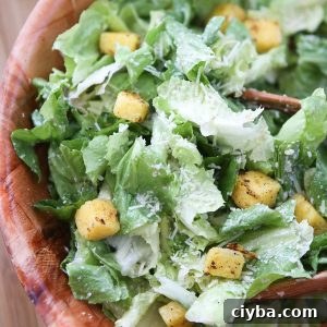 Escarole Caesar Salad with Parmesan Walnut Vinaigrette and Polenta Croutons - a delicious twist on caesar salad! Recipe via aggieskitchen.com