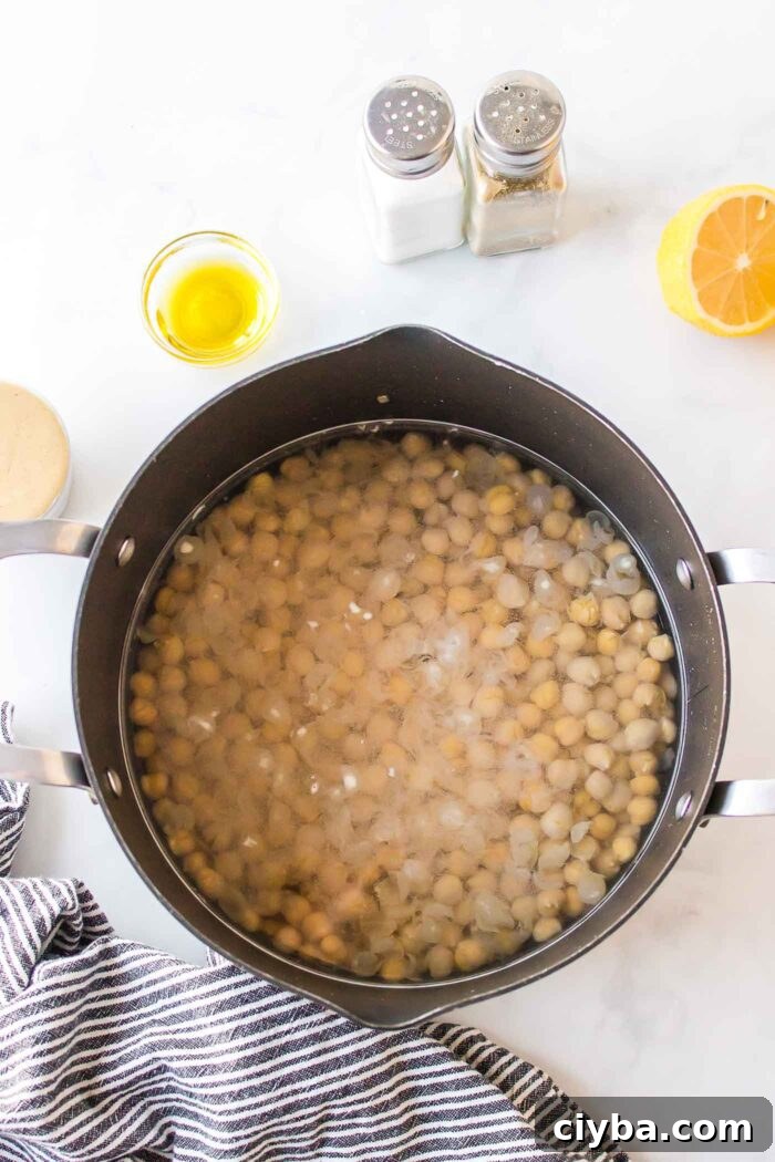 A pot of chickpeas in water.