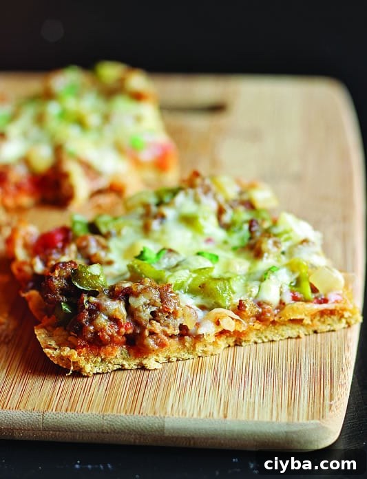 Biscuit Pizza with Sausage and Peppers