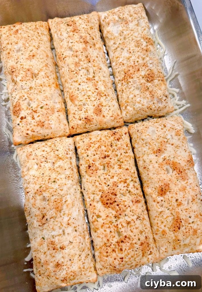 Deep-Dish Hot Pocket Pizza: Crispy Stuffed Pizza Pockets 6 Hot pockets on the bottom of the pan.